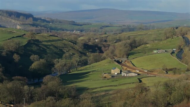 Establishing Drone Shot of Yorkshire Dales Landscape with Trees Winter