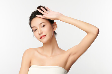 Beautiful Young Asian woman lifting hands up to show off clean and hygienic armpits or underarms on...