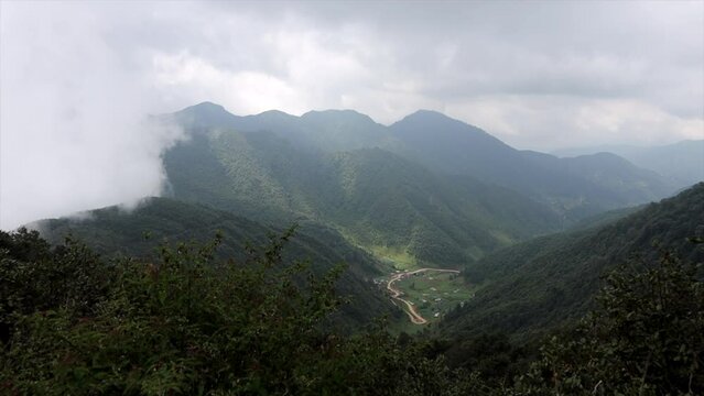 Cloudy mountains with sunlight in Chandragiri in Nepal.