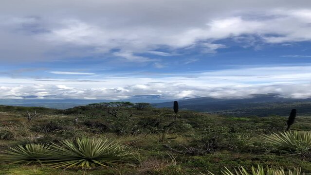 Exploring the Majesty of Bogot&aacute;: Hiking Adventure Reel Video, Backpacking Adventure, Hiking in the best weather under the bright blue sky of Colombia with white clouds, Lucious greenery mountains