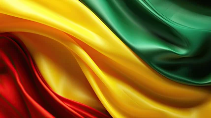 Foto op Canvas Abstract Colorful Silk Wave Fabric in Green, Yellow, and Red colors. Black History Month Concept Background © RBGallery