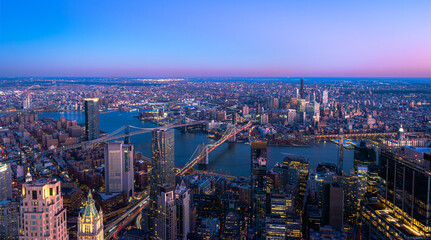 Fototapeta na wymiar Skyline of Manhattan New York City during the night.View of Brooklyn and Manhattan Bridge over East River.