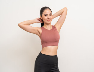 Fototapeta na wymiar Young beautiful smiling asian woman with sportswear on isolated white background. Portrait happy healthy slim fit and firm latin attractive sporty woman standing pose exercise workout in studio.