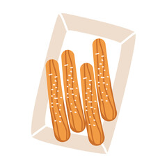 Churros sticks in paper bag with sugar powder