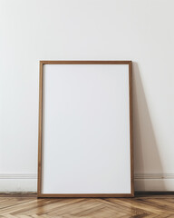mockup of a blank large light oak frame leaning against a white wall. - obrazy, fototapety, plakaty