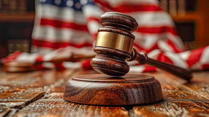 Fotobehang Wooden gavel and usa flag on wooden table. Law concept © Aliaksandra