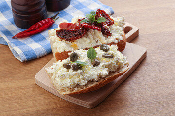 bruschetta with soft cheese capers and tomato