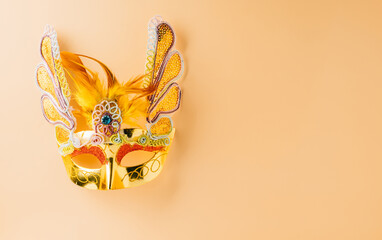Happy Purim carnival decoration. Purim and Mardi Gras in Hebrew, Masquerade party event,...