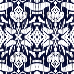 Beautiful Ethnic Ikat abstract Indigo, dark blue and white Indian. The seamless Indigo, dark blue and White pattern in tribal.