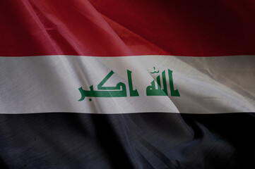Naklejka premium national wavy fabric flag of IRAK