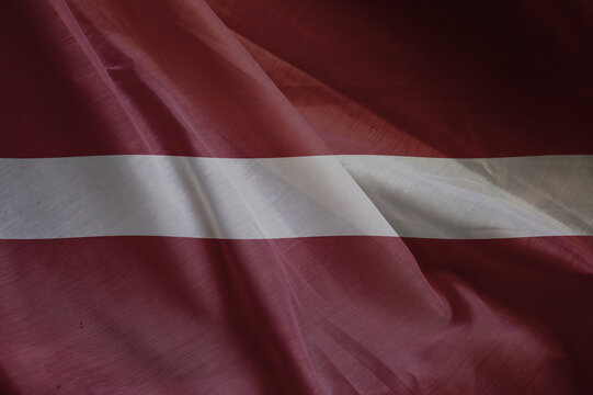 national wavy fabric flag of  LATVIA