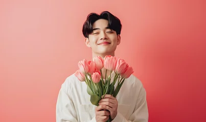 Fotobehang young Korean man holding a bouquet of tulips,Generative AI © simba kim