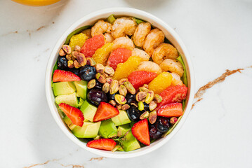 buddha bowl with fresh fruits and shrimps