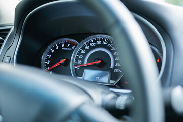 Naklejka premium Close up of a speedometer in a modern car. Selective focus.