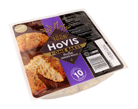 Hovis home bakes rustic seeded rolls in a pack containing four part baked seeded rolls