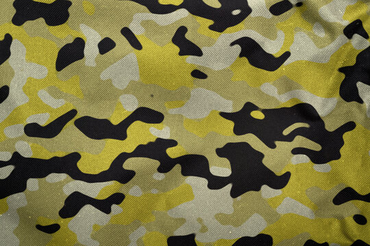 flashy yellowish green army camouflage tarp texture , camo fabric background