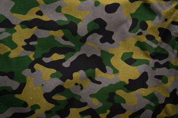 green , yellow and grey woodland army camouflage tarp texture , camo fabric background