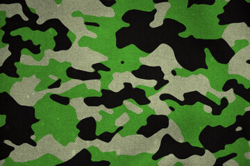 black , grey and flashy green woodland army camouflage tarp texture , camo pattern background © eric