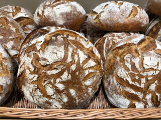 Freshly baked loaves of round rye bread