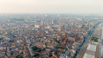 Poster Antwerp, Belgium. Panorama overlooking the Cathedral of Our Lady (Antwerp). Historical center of Antwerp. City is located on the river Scheldt (Escaut). Summer morning, Aerial View © nikitamaykov