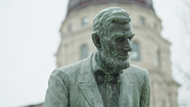 Abraham Lincoln statue on the grounds of the Kansas state capitol in Topeka, Kansas with video close up.