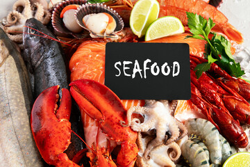 Fresh fish and seafood arrangement. Fresh lobster, mussels, oysters as an ocean gourmet dinner.