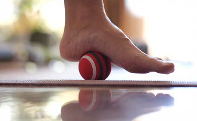 Foot massager and trigger massage ball closeup. Myofascial relaxation of the hypermobile muscles of...