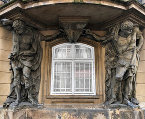Obraz premium Baroque palace with muscular Moorish men supporting a balcony