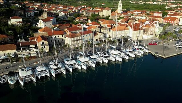Aerial view of Jelsa Town with harbour area at the coastline of the island Hvar in Croatia, Europe
