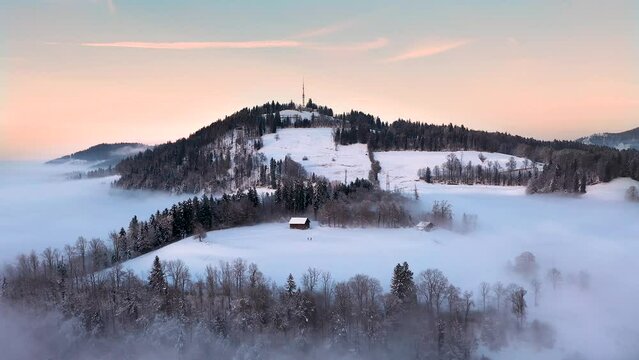 Dronevideo in the Sunset. We see the Highlands of Z&uuml;rcher Oberland, Switzerland.