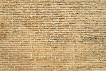 background is made of thin brown brick. Brick wall texture or background