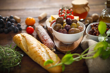 Italian food ingredients on wooden background
