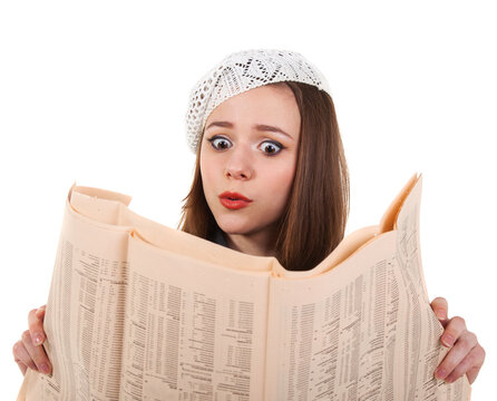 Young cute brunette girl with newspaper