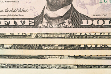 American presidents' names on dollars, close up