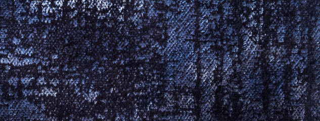 Texture of velvet navy blue background from soft upholstery textile material, macro. Abstract...