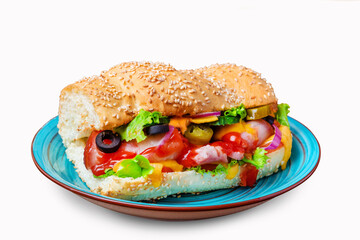Sandwich with bacon, jalapeno, onion, cheese, cucumber and lettuce. Isolated.