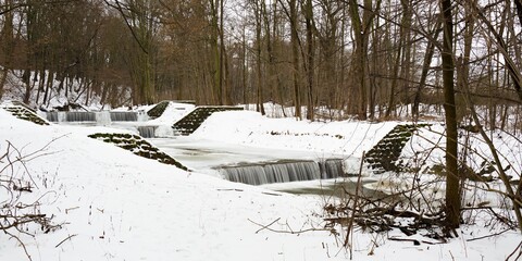 Frozen system of three weirs in winter. Juhyne. Moravia.Czechia. 