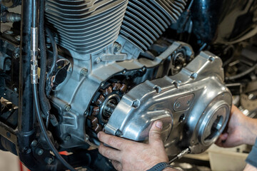 Vibrant snapshots capture the skilled artistry at a motorcycle repair workshop—mechanics in...