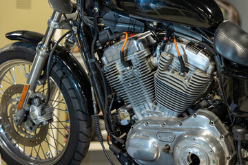 Fototapeta premium Vibrant snapshots capture the skilled artistry at a motorcycle repair workshop—mechanics in action, tools gleaming, and the hum of reviving engines