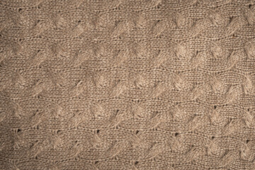 Grunge background with woven texture of a wool sweater