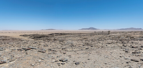 layers and crumble of basalt rocks in Naukluft desert, near Kriess se rus,  Namibia