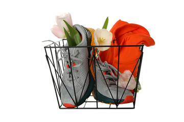 PNG, basket with sports accessories and flowers, isolated on white background.