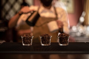 Coffee beans and barista