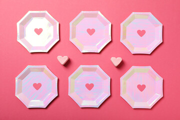 Plates with hearts concept for Valentine's Day.