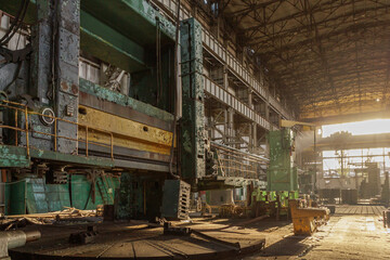 Fototapeta na wymiar Destroyed and abandoned mechanical plant during war in Ukraine.