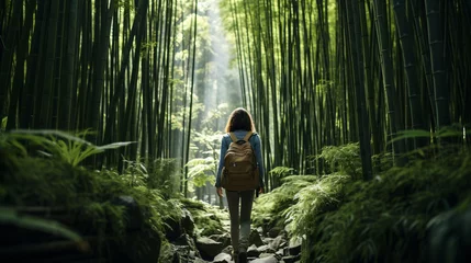 Tuinposter Eco-friendly traveler in bamboo forest © Little