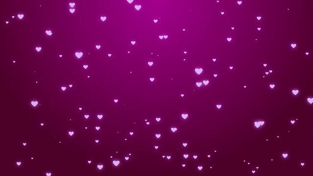 Seamless loop video. Abstract pink glowing hearts on dark background. Concept video for valentine's day, anniversary, mother's day, marriage, invitation e-card