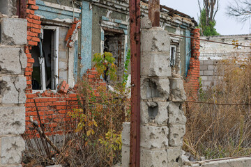 Destroyed and abandoned residental building during war in Ukraine.