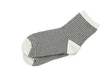Pair of striped knitted socks isolated on white background.