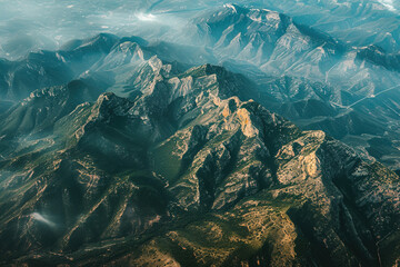 Fototapeta na wymiar Overhead shots of mountain ranges showcasing abstract patterns.